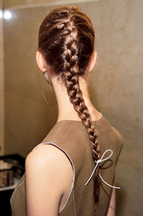 16. Sleek Braids A simple white bow adds oomph to a streamlined look.